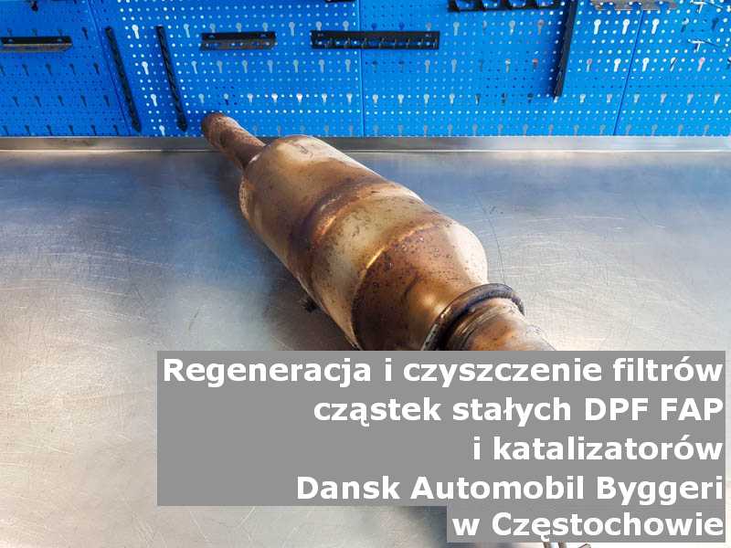 Myty filtr cząstek stałych GPF marki Dansk Automobil Byggeri, w pracowni regeneracji na stole, w Częstochowie.