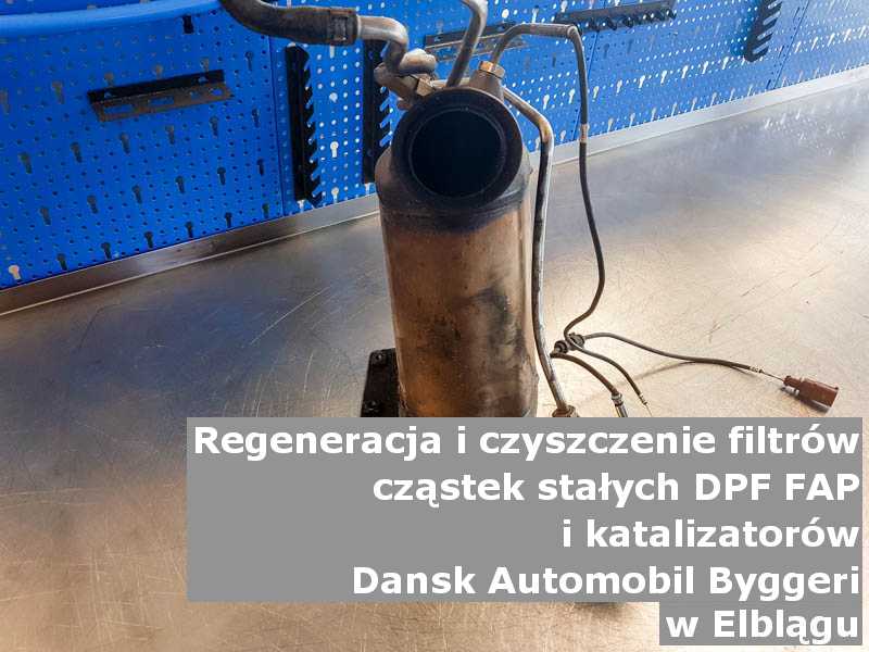 Myty katalizator utleniający marki Dansk Automobil Byggeri, w pracowni regeneracji na stole, w Elblągu.