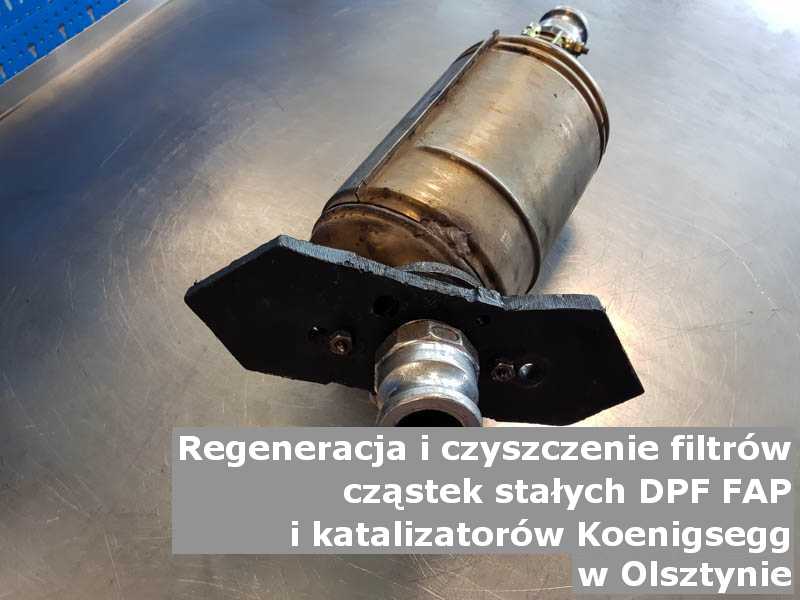 Wyczyszczony filtr cząstek stałych FAP marki Koenigsegg, w pracowni regeneracji na stole, w Olsztynie.