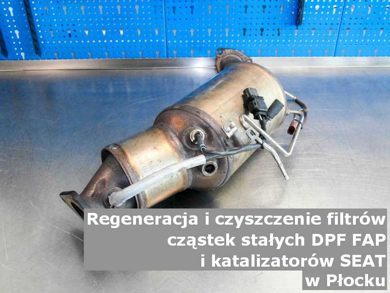 Regenerowany filtr cząstek stałych GPF marki SEAT, w pracowni regeneracji na stole, w Płocku.
